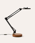 Black adjustable Canvas LED desk lamp with wooden base on a white background