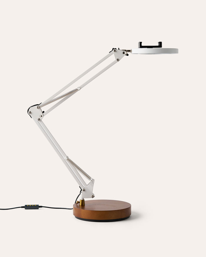 Canvas LED desk lamp with wooden base on a white background