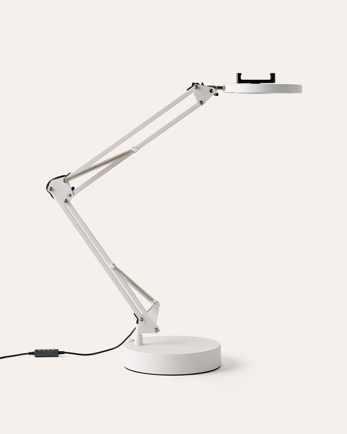 White adjustable Canvas LED desk lamp with a white Matte Metal base