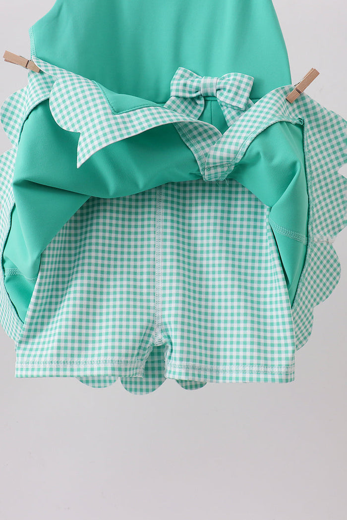 Green scalloped bow active dress